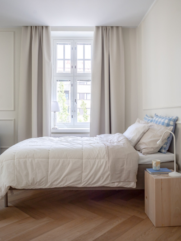 Yksion-remontti-toolo-olohuone:keittio-Mariel-Interior-5 Remontoidun yksiön makuutila.